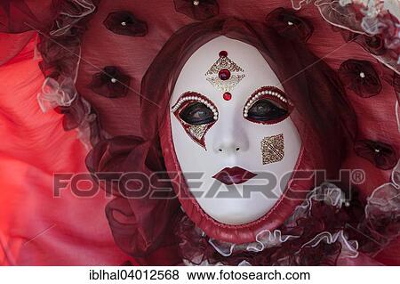 Stock Photo - "Venetian Carnival mask and costume at the Venetian Fair on the historic market square, Ludwigsburg, Baden-Wurttemberg, Germany, Europe". Fotosearch