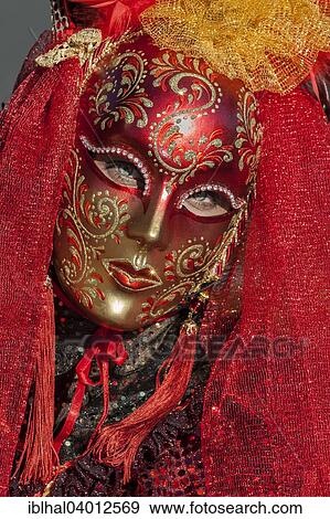 Stock Photo - "Venetian Carnival mask and costume at the Venetian Fair on the historic market square, Ludwigsburg, Baden-Wurttemberg, Germany, Europe". Fotosearch