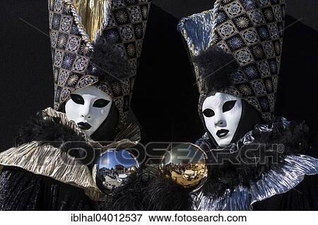 Stock Photo - "Venetian Carnival masks and costumes at the Venetian Fair on the historic market square, Ludwigsburg, Baden-Wurttemberg, Germany, Europe". Fotosearch