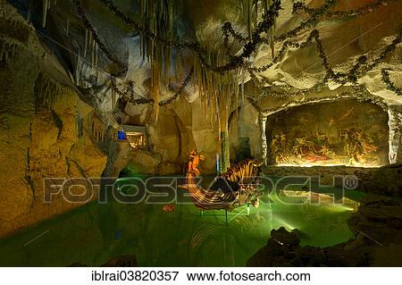 "Venus Grotto of King Ludwig II, artificial stalactite cave with a lake and a shell-shaped boat, painting """"Tannhauser bei Frau Venus"""" by August von Heckel, palace gardens of Linderhof Palace, Upper Bavaria, Bavaria, Germany, Europe" View Large Photo Image Stock Photo - "Venus Grotto of King Ludwig II, artificial stalactite cave with a lake and a shell-shaped boat, painting """"Tannhauser bei Frau Venus"""" by August von Heckel, palace gardens of Linderhof Palace, Upper Bavaria, Bavaria, Germany, Europe". Fotosearch