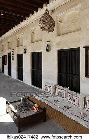 Veranda with a seating area on the ground, typical residential dwelling of the Emirates, Heritage House, Dubai, United Arab Emirates, Middle East, Asia View Large Photo Image Stock Image - Veranda with a seating area on the ground, typical residential dwelling of the Emirates, Heritage House, Dubai, United Arab Emirates, Middle East, Asia. Fotosearch