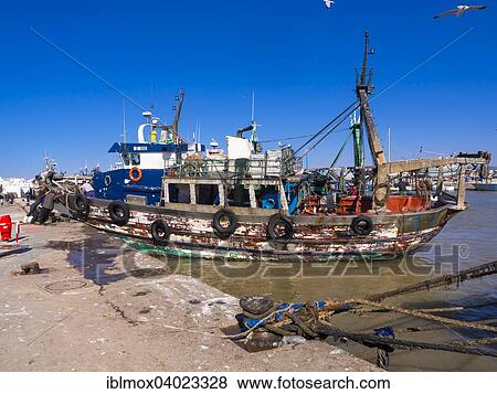 "Very old fishing boat in the port of Essaouira, Unesco World Heritage Site, Morocco, Africa" View Large Photo Image Stock Photo - "Very old fishing boat in the port of Essaouira, Unesco World Heritage Site, Morocco, Africa". Fotosearch