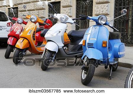 "Vespas parked in a row in a back road, Vienna, Austria, Europe" View Large Photo Image Stock Photography - "Vespas parked in a row in a back road, Vienna, Austria, Europe". Fotosearch