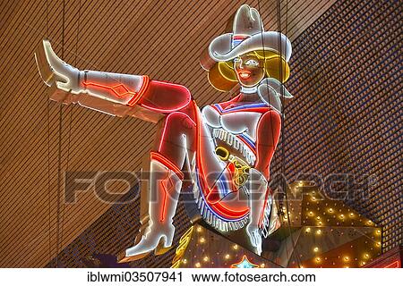 "Vicky, famous Cowgirl figure, neon signage of Glitter Gulch Casino Hotel, Fremont Street Experience in old Vegas, downtown, Las Vegas, Nevada, United States, North America" View Large Photo Image Stock Image - "Vicky, famous Cowgirl figure, neon signage of Glitter Gulch Casino Hotel, Fremont Street Experience in old Vegas, downtown, Las Vegas, Nevada, United States, North America". Fotosearch