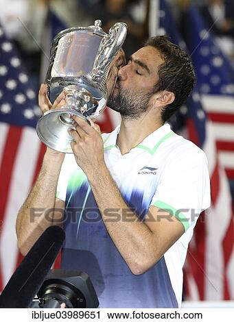 "Victory ceremony, Marin Cilic, CRO, with cup, US Open 2014, ITF Grand Slam Tennis Tournament, USTA Billie Jean King National Tennis Center, Flushing Meadows, New York, United States, North America" View Large Photo Image Stock Image - "Victory ceremony, Marin Cilic, CRO, with cup, US Open 2014, ITF Grand Slam Tennis Tournament, USTA Billie Jean King National Tennis Center, Flushing Meadows, New York, United States, North America". Fotosearch