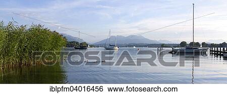 "View across lake Chiemsee to the Bavarian Alps, Chiemgau, Upper Bavaria, Bavaria, Germany, Europe" View Large Photo Image Stock Photograph - "View across lake Chiemsee to the Bavarian Alps, Chiemgau, Upper Bavaria, Bavaria, Germany, Europe". Fotosearch