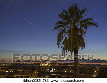 Stock Image - "View across the city at night with St. Peter's Basilica, Rome, Lazio, Italy, Europe". Fotosearch