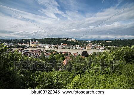 Stock Photography - "View across the historic centre, Inn River during high waters, Passau, Lower Bavaria, Bavaria, Germany, Europe". Fotosearch