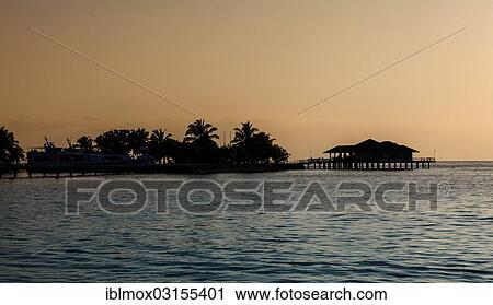 Stock Image - "View across the lagoon to the jetty and the restaurant on Paradise Iceland, Indian Ocean, Lankanfinolhu, North Male Atoll, Maldives, Asia". Fotosearch