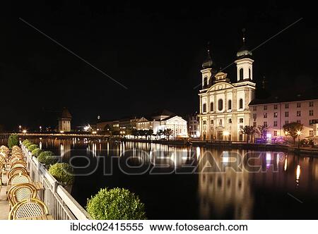 View across the Reuss River towards the Jesuit Church at night, Lucerne, Switzerland, Europe View Large Photo Image Stock Photography - View across the Reuss River towards the Jesuit Church at night, Lucerne, Switzerland, Europe. Fotosearch