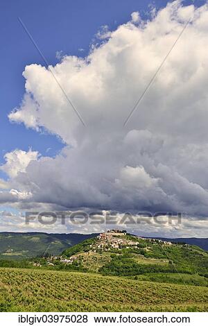 "View across vineyards to the town with atmospheric clouds, Motovun, Montona, Mirna Valley, Istria, Croatia, Europe" View Large Photo Image Stock Photo - "View across vineyards to the town with atmospheric clouds, Motovun, Montona, Mirna Valley, Istria, Croatia, Europe". Fotosearch