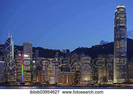 "View at the blue hour from Kowloon on Hong Kong Island's skyline on Hong Kong River, Central, with Bank of China on the far left and IFC Tower far right, Hong Kong, China, Asia" View Large Photo Image Stock Photo - "View at the blue hour from Kowloon on Hong Kong Island's skyline on Hong Kong River, Central, with Bank of China on the far left and IFC Tower far right, Hong Kong, China, Asia". Fotosearch