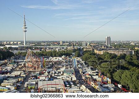 "View from a ferris wheel over Hamburger Dom funfair towards the television tower, Hamburg, Germany, Europe" View Large Photo Image Stock Image - "View from a ferris wheel over Hamburger Dom funfair towards the television tower, Hamburg, Germany, Europe". Fotosearch