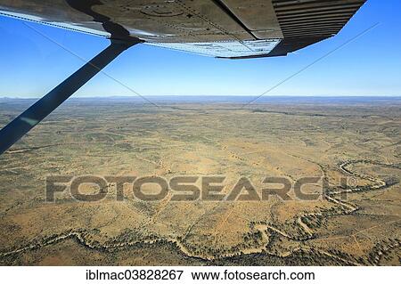 "View from a small plane over the dry riverbed of Oanob River, Khomas Hochland, Namibia, Africa" View Large Photo Image Stock Photo - "View from a small plane over the dry riverbed of Oanob River, Khomas Hochland, Namibia, Africa". Fotosearch
