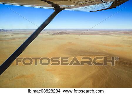 "View from a small plane over the Namib Desert, ‪Namib-Naukluft National Park‬, Namibia, Africa" View Large Photo Image Picture - "View from a small plane over the Namib Desert, ‪Namib-Naukluft National Park‬, Namibia, Africa". Fotosearch