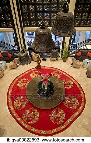 "View from above into the vestibule at the Taj Tashi Hotel, Thimphu, Bhutan, Asia" View Large Photo Image Stock Image - "View from above into the vestibule at the Taj Tashi Hotel, Thimphu, Bhutan, Asia". Fotosearch