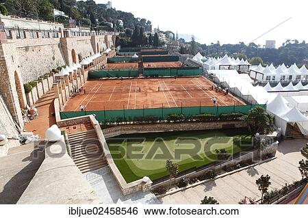 "View from above over the tennis courts and the VIP village of the Monte Carlo Country Club, Monte Carlo Bay Hotel & Resort, Monte Carlo, Principality of Monaco, Cote d'Azur, Mediterranean Sea, Europe" View Large Photo Image Stock Photograph - "View from above over the tennis courts and the VIP village of the Monte Carlo Country Club, Monte Carlo Bay Hotel & Resort, Monte Carlo, Principality of Monaco, Cote d'Azur, Mediterranean Sea, Europe". Fotosearch