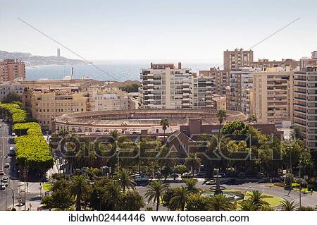 "View from Alcazaba Fortress towards the coast with skyscrapers and a bullring, Malaga, Andalucia, Spain, Europe" View Large Photo Image Stock Photograph - "View from Alcazaba Fortress towards the coast with skyscrapers and a bullring, Malaga, Andalucia, Spain, Europe". Fotosearch