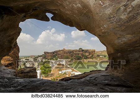 Stock Photography - "View from Badami Caves, carved out of solid rock in 6th to 7th century, across the lake towards the town, Badami, Karnataka, India, Asia". Fotosearch
