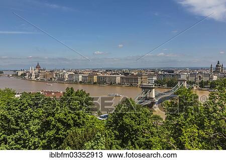 Stock Image - "View from Buda Castle of the Danube, the Parliament and the Chain Bridge, Budapest, Central Hungary, Hungary, Europe". Fotosearch