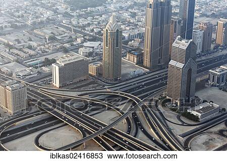 View from Burj Khalifa over a motorway junction on Sheikh Zayed Road, United Arab Emirates, Middle East, Asia View Large Photo Image Stock Image - View from Burj Khalifa over a motorway junction on Sheikh Zayed Road, United Arab Emirates, Middle East, Asia. Fotosearch