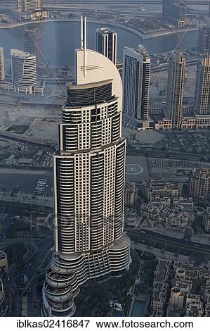 View from Burj Khalifa over a skyscraper, The Address, a luxury hotel and Fountain Lake, Dubai, United Arab Emirates, Middle East, Asia View Large Photo Image Stock Photo - View from Burj Khalifa over a skyscraper, The Address, a luxury hotel and Fountain Lake, Dubai, United Arab Emirates, Middle East, Asia. Fotosearch