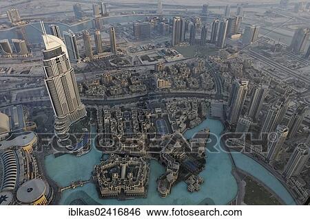 View from Burj Khalifa over a skyscraper, The Address, a luxury hotel and Fountain Lake, Dubai, United Arab Emirates, Middle East, Asia View Large Photo Image Stock Photograph - View from Burj Khalifa over a skyscraper, The Address, a luxury hotel and Fountain Lake, Dubai, United Arab Emirates, Middle East, Asia. Fotosearch