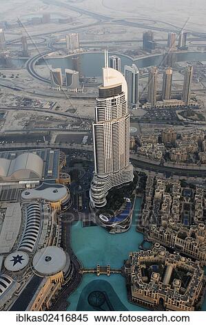 View from Burj Khalifa over a skyscraper, The Address, a luxury hotel and Fountain Lake, Dubai, United Arab Emirates, Middle East, Asia View Large Photo Image Stock Photography - View from Burj Khalifa over a skyscraper, The Address, a luxury hotel and Fountain Lake, Dubai, United Arab Emirates, Middle East, Asia. Fotosearch