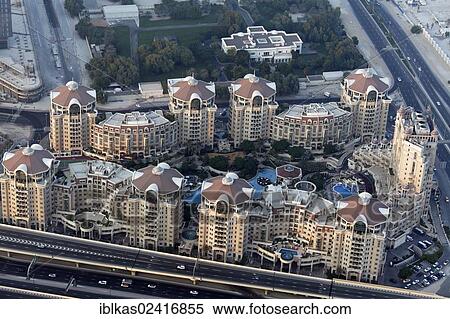 View from Burj Khalifa over a residential complex with luxury apartments and pool areas, Dubai, United Arab Emirates, Middle East, Asia View Large Photo Image Stock Photography - View from Burj Khalifa over a residential complex with luxury apartments and pool areas, Dubai, United Arab Emirates, Middle East, Asia. Fotosearch