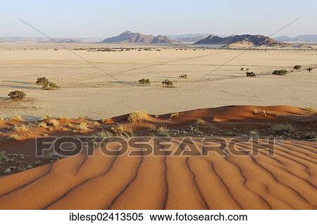 Stock Photography - View from Elim Dune towards the Naukluft Mountains, Namib-Naukluft-Park, Namib-Wuste, Namibia, Africa. Fotosearch