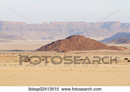 Stock Photography - View from Elim Dune towards the Naukluft Mountains, Namib-Naukluft-Park, Namib-Wuste, Namibia, Africa. Fotosearch