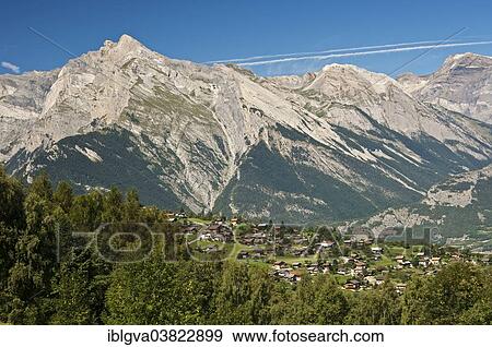 "View from Haute-Nendaz over the Rhone Valley towards the summit of Haut de Cry Mountain in the Bernese Alps, Valais, Switzerland, Europe" View Large Photo Image Stock Photo - "View from Haute-Nendaz over the Rhone Valley towards the summit of Haut de Cry Mountain in the Bernese Alps, Valais, Switzerland, Europe". Fotosearch