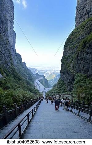 Stock Photo - "View from Heaven's Gate to the long staircase, 900 steps, Tianmen Cave, the world's largest natural water eroded cave, Tianmen National Park, Hunan Province, China, Asia". Fotosearch