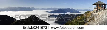 View from Herzogstand across Simmetsberg Mountain and the Ester Mountains towards the Karwendel Mountains and Wetterstein Range, Upper Bavaria, Germany, Europe View Large Photo Image Stock Image - View from Herzogstand across Simmetsberg Mountain and the Ester Mountains towards the Karwendel Mountains and Wetterstein Range, Upper Bavaria, Germany, Europe. Fotosearch