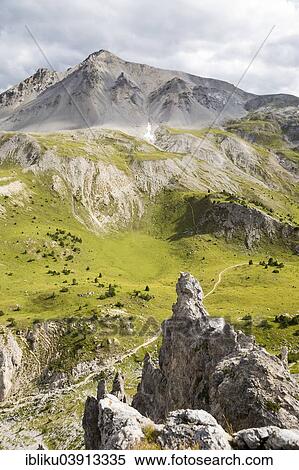"View from Il Jalet viewpoint over the Fuorn Pass, behind the Piz Dadaint, Swiss National Park, Graubunden, Switzerland, Europe" View Large Photo Image Stock Photography - "View from Il Jalet viewpoint over the Fuorn Pass, behind the Piz Dadaint, Swiss National Park, Graubunden, Switzerland, Europe". Fotosearch