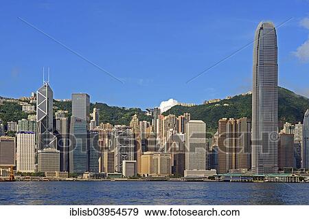 Stock Photo - "View from Kowloon on Hong Kong Island's skyline on Hong Kong River, Central, with Bank of China on the far left and IFC Tower far right, Hong Kong, China, Asia". Fotosearch