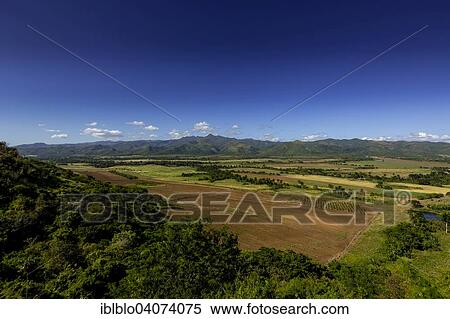 Stock Photography - "View from Mirador, lookout, over the Valle de los Ingenios, Sancti Spiritus Province, Kuba". Fotosearch