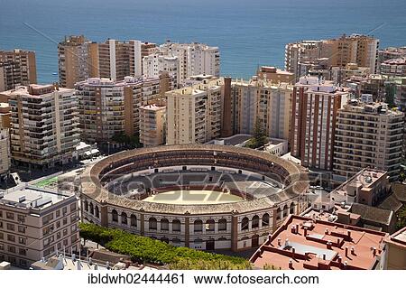 "View from Monte de Gibralfaro over a bullring surrounded by skyscrapers, Malaga, Andalucia, Spain, Europe, PublicGround, Europe" View Large Photo Image Stock Image - "View from Monte de Gibralfaro over a bullring surrounded by skyscrapers, Malaga, Andalucia, Spain, Europe, PublicGround, Europe". Fotosearch