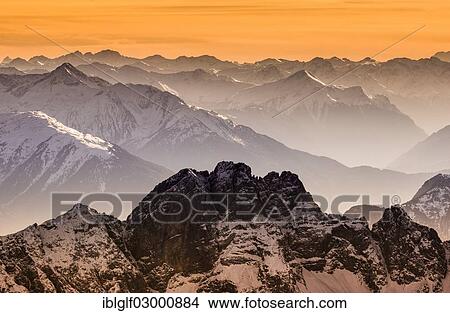 "View from Mount Zugspitze to the south-west, Garmisch-Partenkirchen, Grainau, Upper Bavaria, Bavaria, Germany, Europe, Zugspitze, Wetterstein mountain range, Eastern Alps, Ehrwald, Tyrol, Austria, Europe" View Large Photo Image Picture - "View from Mount Zugspitze to the south-west, Garmisch-Partenkirchen, Grainau, Upper Bavaria, Bavaria, Germany, Europe, Zugspitze, Wetterstein mountain range, Eastern Alps, Ehrwald, Tyrol, Austria, Europe". Fotosearch