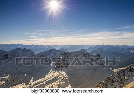 Stock Image - "View from Mount Zugspitze to the south, Garmisch-Partenkirchen, Grainau, Upper Bavaria, Bavaria, Germany, Europe, Zugspitze, Wetterstein mountain range, Eastern Alps, Grainau, Upper Bavaria, Bavaria, Germany, Europe". Fotosearch
