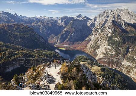 "View from Mt Jenner of the viewing platform, Konigssee Lake and Mt Watzmann, Berchtesgaden National Park, Berchtesgaden Alps, Berchtesgadener Land district, Upper Bavaria, Bavaria, Germany, Europe" View Large Photo Image Stock Photography - "View from Mt Jenner of the viewing platform, Konigssee Lake and Mt Watzmann, Berchtesgaden National Park, Berchtesgaden Alps, Berchtesgadener Land district, Upper Bavaria, Bavaria, Germany, Europe". Fotosearch