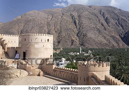 "View from Nakhal Fort or Husn Al Heem, fortress, historic mudbrick building, across the Nakhl Oasis to the Jebel Nakhl Massiv, Al-Batinah province, Sultanate of Oman, Arabian Peninsula" View Large Photo Image Stock Image - "View from Nakhal Fort or Husn Al Heem, fortress, historic mudbrick building, across the Nakhl Oasis to the Jebel Nakhl Massiv, Al-Batinah province, Sultanate of Oman, Arabian Peninsula". Fotosearch