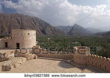"View from Nakhal Fort or Husn Al Heem, fortress, historic mudbrick building, across the Nakhl Oasis to the Jebel Nakhl Massiv, Al-Batinah province, Sultanate of Oman, Arabian Peninsula" View Large Photo Image Stock Photo - "View from Nakhal Fort or Husn Al Heem, fortress, historic mudbrick building, across the Nakhl Oasis to the Jebel Nakhl Massiv, Al-Batinah province, Sultanate of Oman, Arabian Peninsula". Fotosearch
