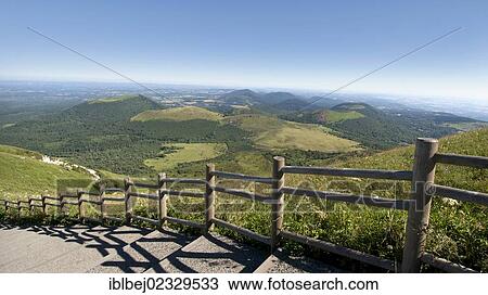 Stock Image - "View from Puy de Dome onto the volcanic landscape of the Chaine des Puys, Auvergne, France, Europe". Fotosearch