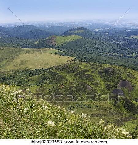 Stock Image - "View from Puy de Dome onto the volcanic landscape of the Chaine des Puys, Auvergne, France, Europe". Fotosearch