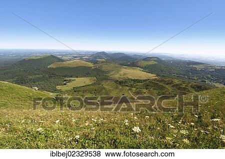 Stock Photo - "View from Puy de Dome onto the volcanic landscape of the Chaine des Puys, Auvergne, France, Europe". Fotosearch