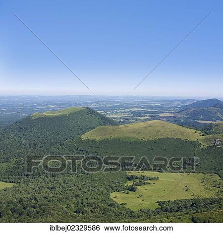 Stock Photograph - "View from Puy de Dome onto the volcanic landscape of the Chaine des Puys, Auvergne, France, Europe". Fotosearch