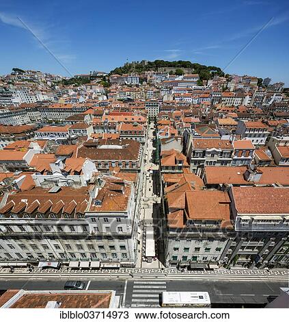 Stock Image - "View from Santa Justa Elevator, Elevador de Santa Justa or Elevador do Carmo over the historic city centre of Lisbon with red roofs, Baixa, Lisbon, Lisbon District, Portugal, Europe". Fotosearch