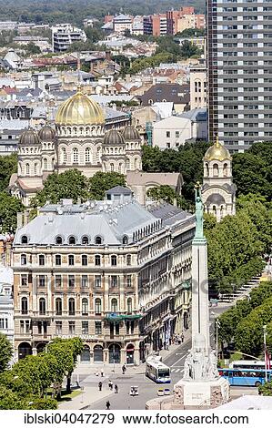 "View from St. Peter's Church on the Freedom Monument with the Nativity Cathedral, Riga, Latvia, Europe" View Large Photo Image Stock Photo - "View from St. Peter's Church on the Freedom Monument with the Nativity Cathedral, Riga, Latvia, Europe". Fotosearch