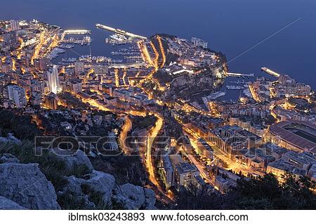 Stock Image - "View from Tete de Chien over the Principality of Monaco, evening mood, La Turbie, Departement Alpes-Maritimes, Region Provence-Alpes-Cote dâ€™Azur, France, Europe". Fotosearch